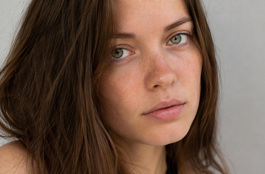 freckles and natural skin texture