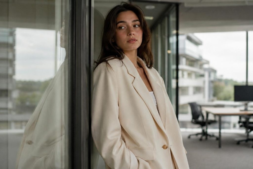 woman wearing oversized cream blazer