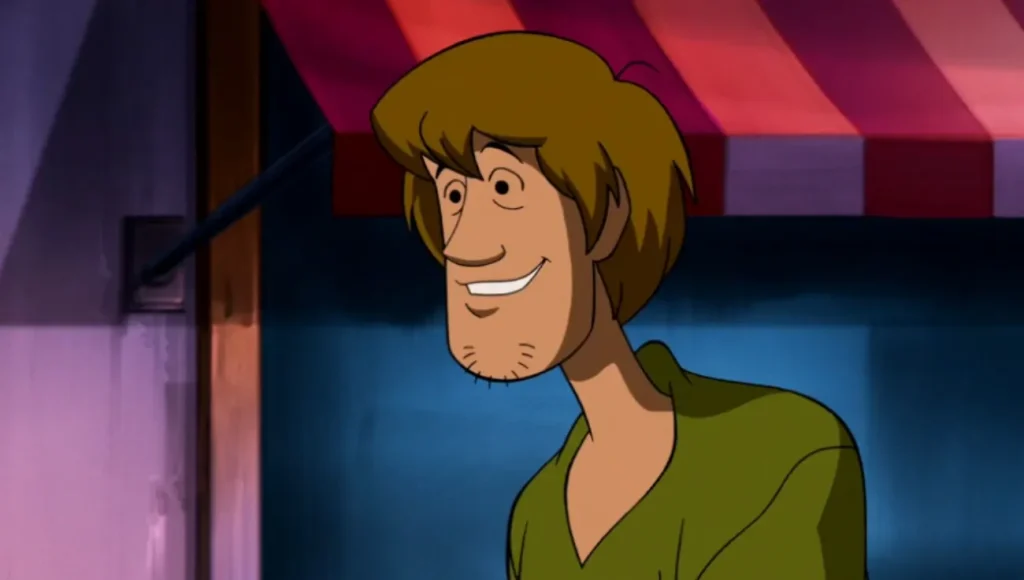 shaggy smiling awkwardly indoors